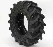Belgian artist immortalizes car and truck tires with intricate floral structure carvings