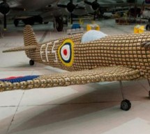 Sculptors create full size Spitfire airplane from 6,500 egg cartons