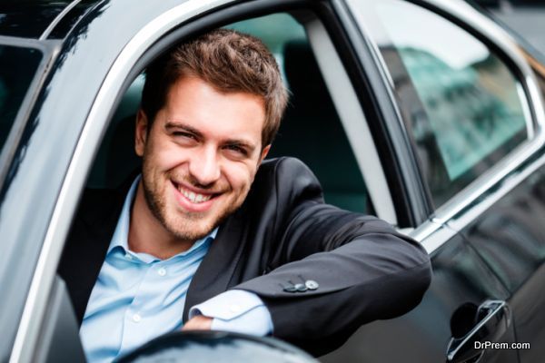 Handsome man driving his car