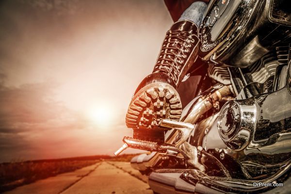 Biker girl riding on a motorcycle