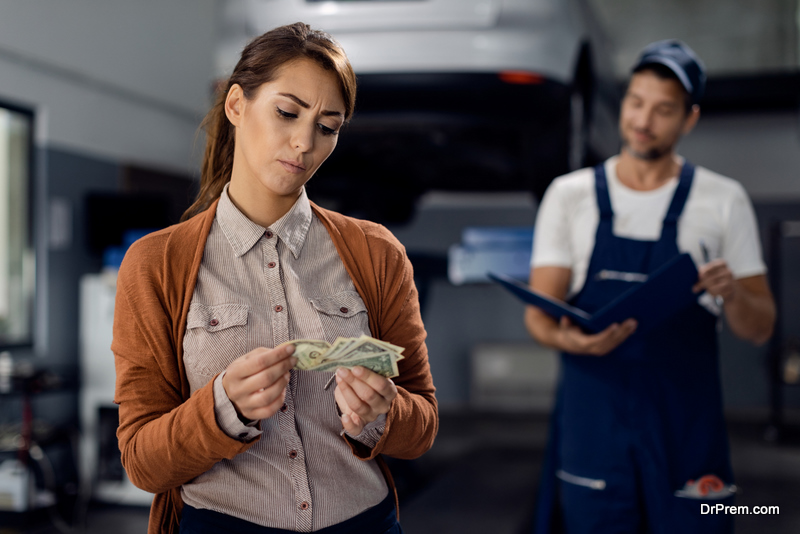 woman-paying-for-repair-or-maintenance-of-the-car